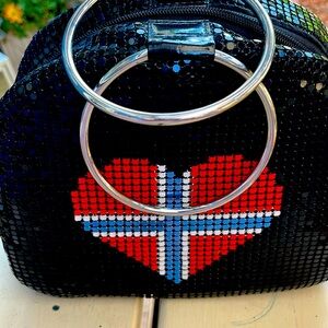Black handbag with flag